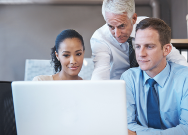 financial advisers at laptop